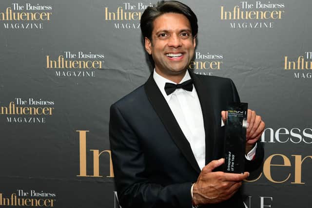 Amarjit Binji with his award