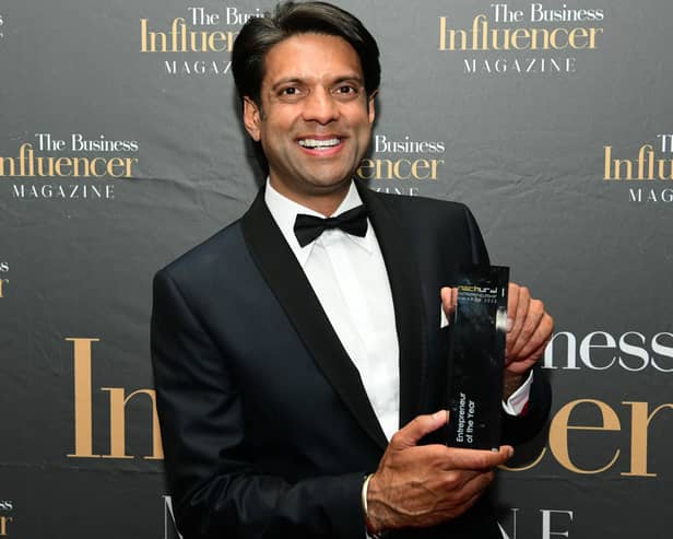 Amarjit Binji with his award