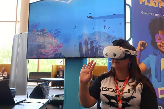 Testing out the virtual reality at technology innovation event, Merged Futures.