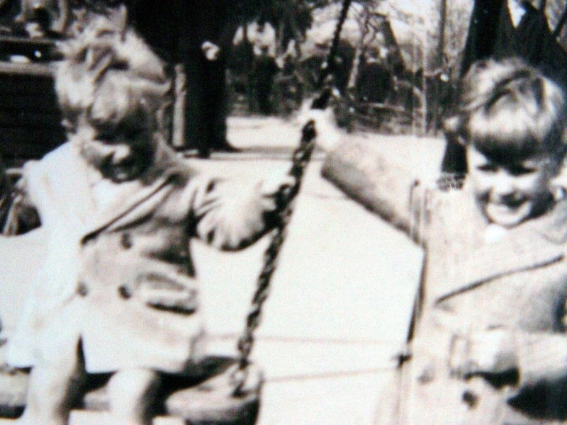 Kettering, Philip Bailey on the swing with his brother at Wicksteed Park/UGC