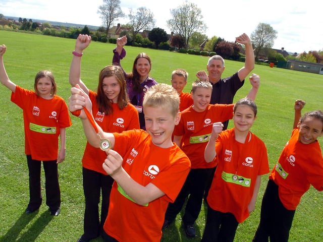 Pupils who took part in the Kids of Steel Triathlon, May 2010 - back, coaches Maree Jesson and Steve Stredwick. Middle, Jasmine Elliott, 12, Rosie Watts, 12, Connor Bush, 12, Jordan Stanley, 12, Maria Gent, 11, and Connor Bailey, 12. Front, Joshua Cayford, 12