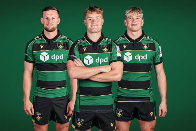 Rory Hutchinson, Fin Smith and Henry Pollock showing off Saints' new home kit (picture: Northampton Saints)