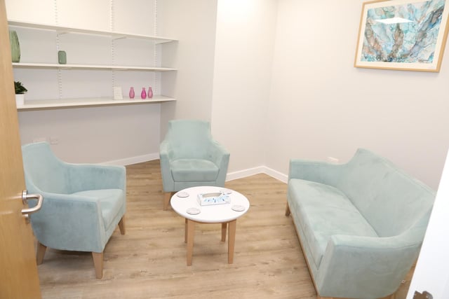 The Macmillan Cancer Support Centre at Kettering General Hospital contains two rooms for patients to talk to staff with two doors so patients don't have to walk through waiting rooms if they don't want to