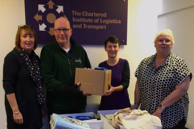Martin, Corby Foodbank manager collecting the donations of food and non food items