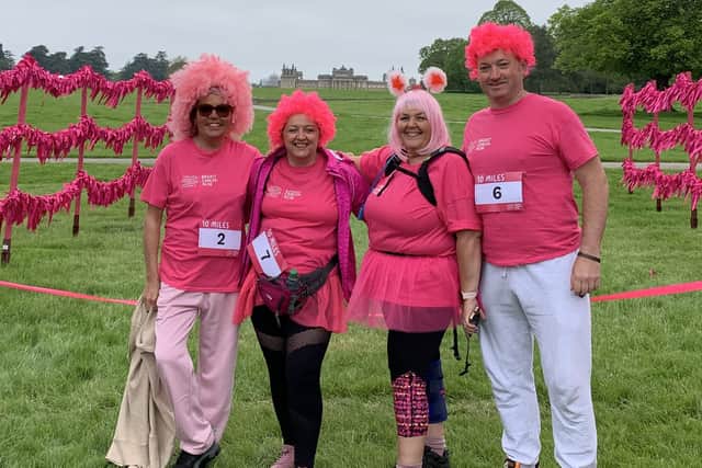 Maxine Lloyd, second left with other National Lottery winners at Blenheim Palace, on a sponsored walk raising £2,000 for charity Breast Cancer Now