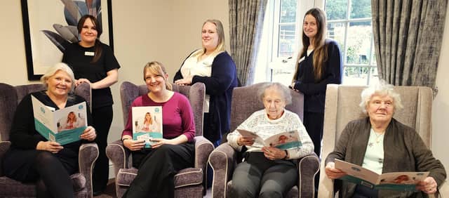 Nikki Ramskill with Customer Relationship Manager Louise Ramage, with Staff and residents from Elm Bank Care Home