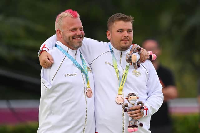 Kieran Rollings savours the moment with Craig Bowler after they secured bronze