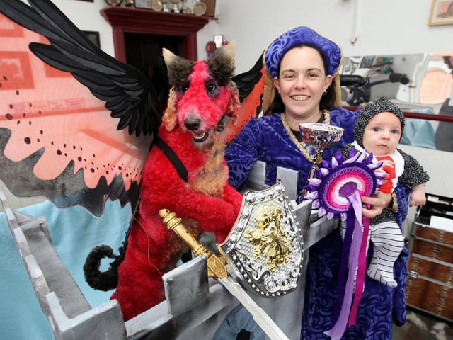 RUSHDEN. Su Eld-Weaver of It's A Dog's Life who won Creative Groomer of the Year at the English Grooming Championships. Pictured with eight week old Quinn Eld - Weaver and standard poodle Denni recreating the taming of the Dragon.
 June 2010
:
