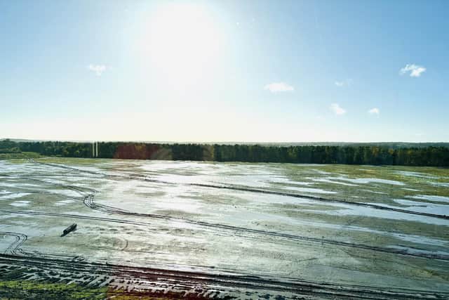 The site where Nike are building a 43-acre campus in Corby, with Cowthick Plantation in the background. Image: National World