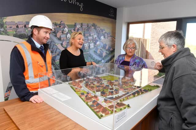 Mulberry Homes and members of the Irchester Parish Council viewing the plans for Steeple View Chase