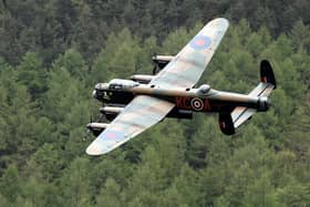 A Lancaster bomber flies over Ladybower reservoir in the Derbyshire Peak District to mark the 70th anniversary of the World War II Dambusters mission on in Derwent, England. Ladybower and Derwent reservoirs were used by the RAF's 617 Squadron in 1943 to test Sir Barnes Wallis' bouncing bomb before their mission to destroy dams in Germany's Ruhr Valley. This was taken to marks the 70th anniversary of the famous Dambuster mission and will be watched by veterans from the original campaign.  (Photo by Christopher Furlong/Getty Images)