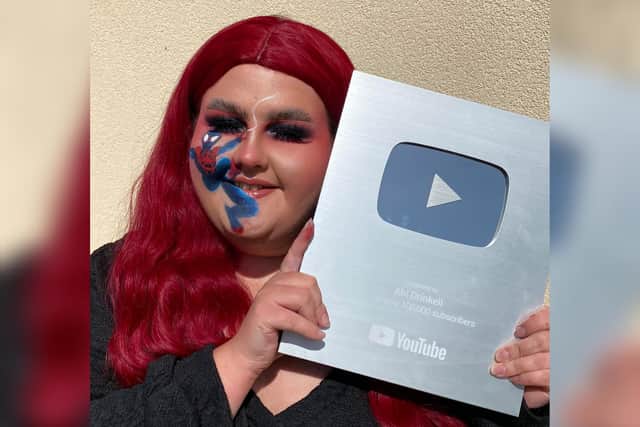 Abi with her award from YouTube