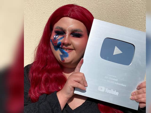 Abi with her award from YouTube