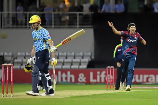 Jack White celebrates claiming a final-over wicket in the crucial win over Birmingham Bears at a packed County Ground in July (Picture: Peter Short)