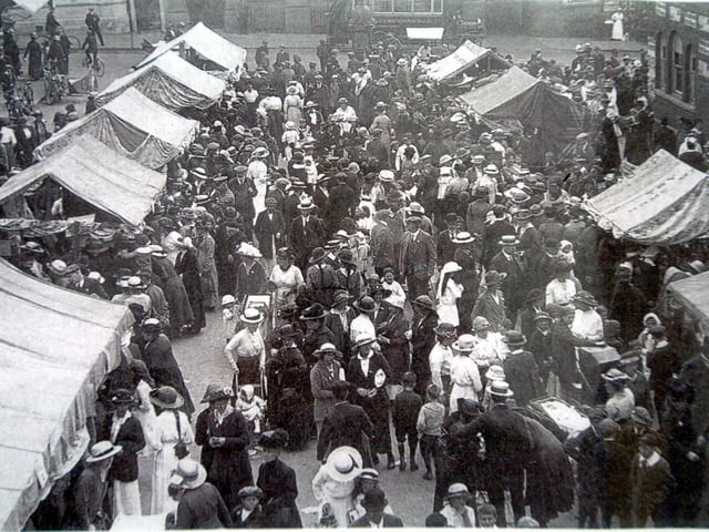 Market in Market Hill looking down to Market Street in Wellingborough in 1904