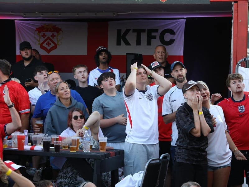 Fans at the Kettering Town FC World Cup Fan Zone watch England vs Argentina in the semi-final