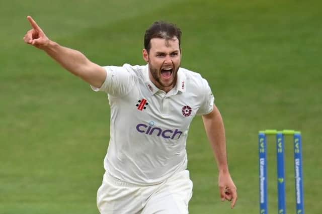 Matt Kelly celebrates taking the wicket of Essex's Adam Wheater
