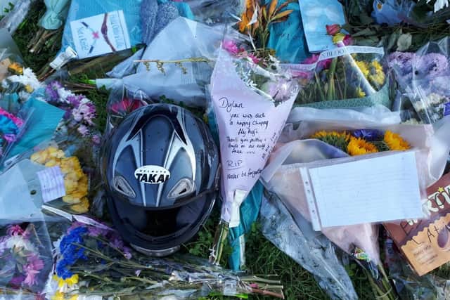 Tributes left where Dylan Holliday was stabbed to death