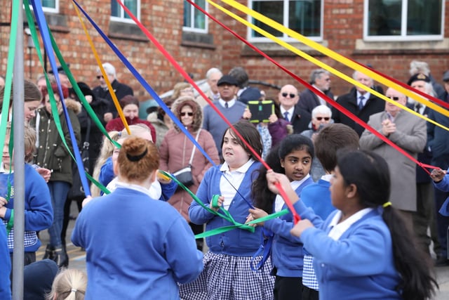 Pupils show off their dancing skills with a Maypole dance