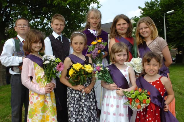 Woodford School may celebrations 2008 May Queen Katie Spimpolo with Joel Cooper, Mitchell Adams Erin Munton and Georgina Hedley, Chloe Ireson, Sophie Frampton-Watts, Hanna Dickens, and Carry Gaze