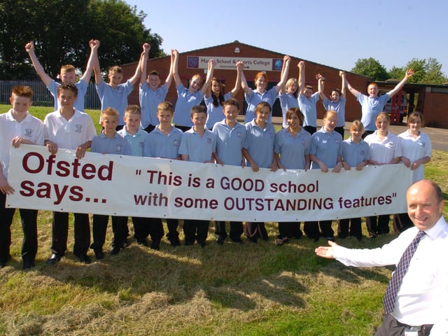 Headteacher Paul Wingfield and pupils celebrate a good Ofsted report, June 2006