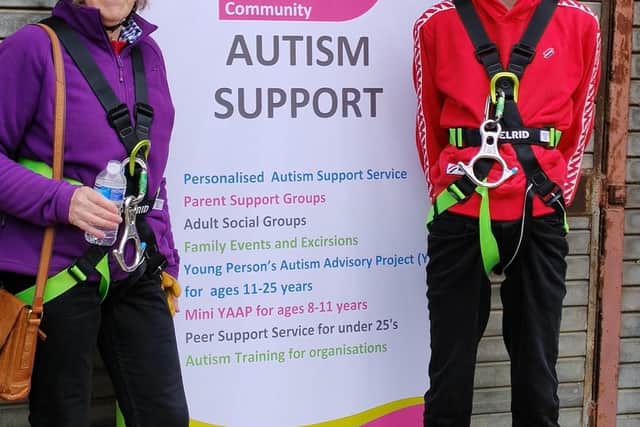 Abseilers fresh from their descent from the lift tower