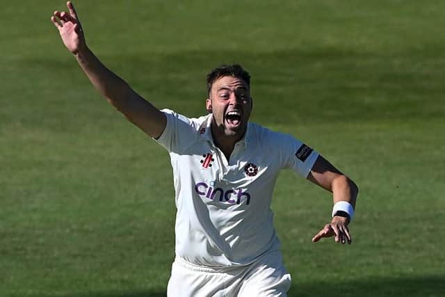 Harry Conway celebrates claiming a wicket for Northants against Lancashire in May... the Australian is returning to Wantage Road for a seven-match stint in 2026