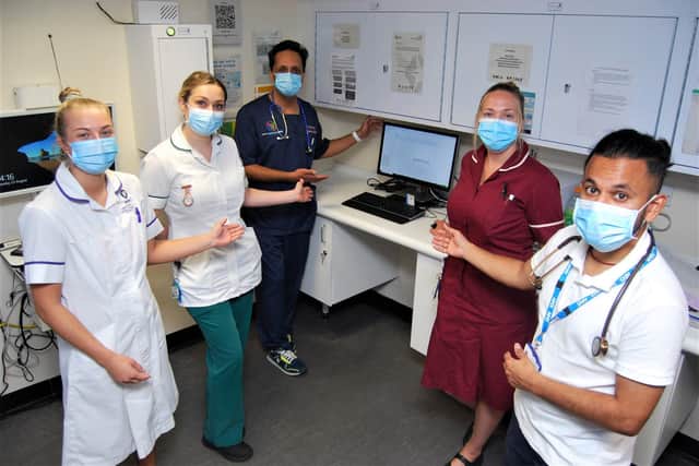 Staff from Kettering General Hospital’s Frailty Same Day Emergency Care unit inside A&E who are using the new technology.