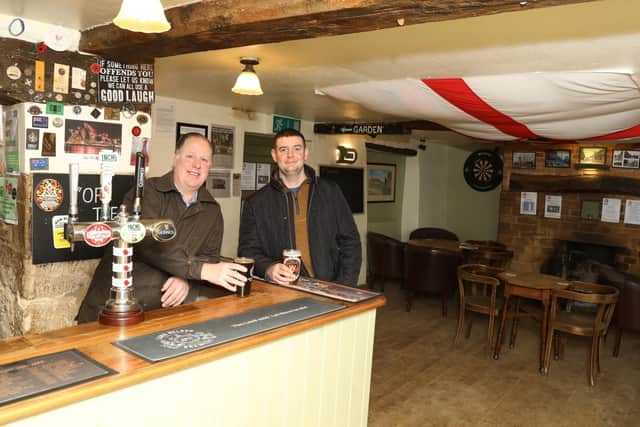 L-r Jayme Bent (landlord) and owner Gareth Williams in the Cock Inn, Denford