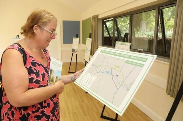 Debbie Barton looking at the plans at a previous consultation event