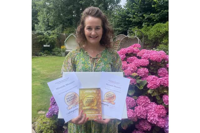Miranda Menzies with her awards