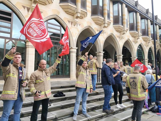 Firefighters are protesting outside The Guildhall in Northampton.
