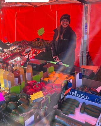 Demi at her market stall