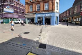 The old paving and the new - in Kettering High Street