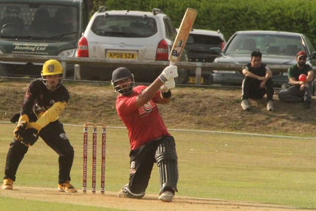 Zaakir Khawaja hits out on his way to 92 for Kislingbury Temperance in their win over Peterborough (Picture: Finbarr Carroll)