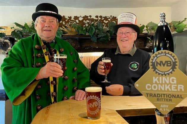 Exonerated World Men’s Conker Champion David Jakins (left) and World Conker Championships Chief Umpire, Richard Howard, enjoy a pint of King Conker bitter at The Shuckburgh Arms in Southwick (image: Hilly Horton).