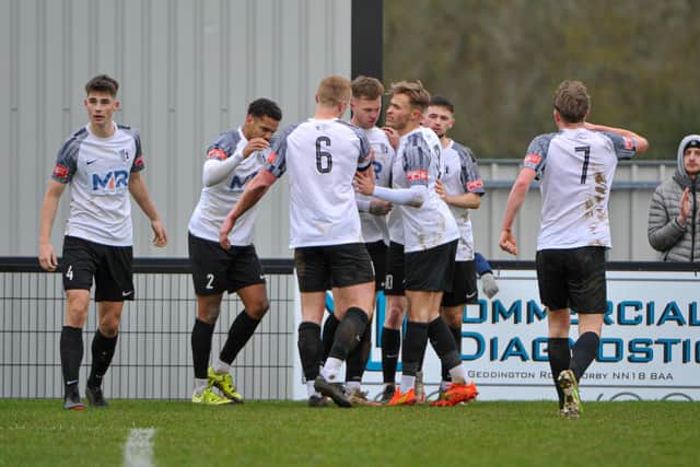 Callum Milne takes the congratulations after he scored Corby's first goal against Gresley