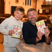 Hayden Smith age 9, with author Chris Smith who signed copies of his 'Kids normal books' for him