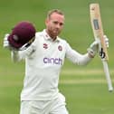 Luke Procter celebrates one of the four centuries he hit last summer