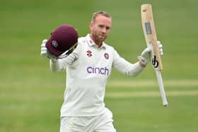 Luke Procter celebrates one of the four centuries he hit last summer