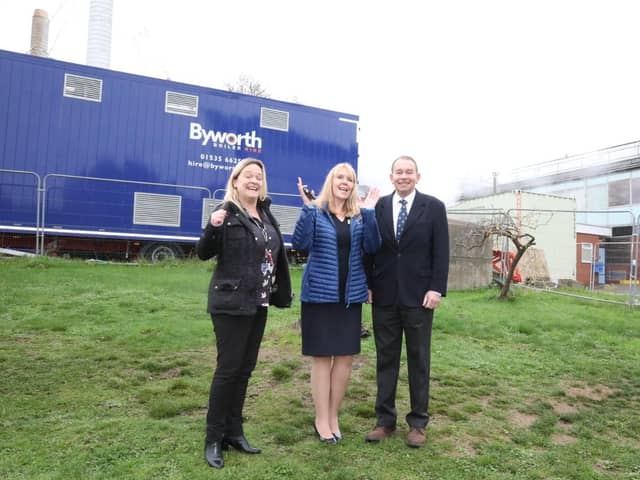 L-r Kettering General Hospital’s Director of Strategy Polly Grimmett, Hospital Chief Executive Deborah Needham, Kettering MP Philip Hollobone in front of the temporary boilers