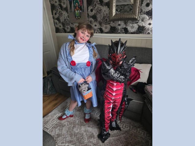 Ruby, 9, as Dorothy from The Wizard of Oz and Isaac, 6, as a dragon