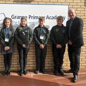 Grange Primary Academy pupils with head teacher Chris Latimer celebrating the 70th anniversary of the school/Grange Primary Academy