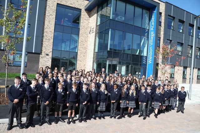 Weldon Village Academy - the pupils and staff on their first day in the new building
