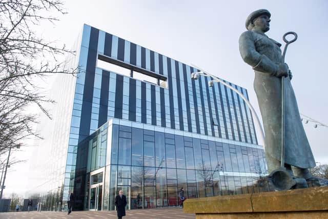 Four police vehicles parked outside Corby Cube were damaged earlier this month