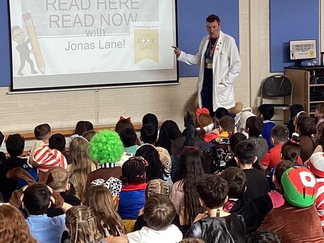 Read Here Read Now Assembly at Camestone School with Jonas Lane.