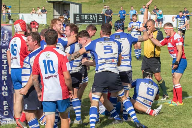 Kettering celebrate their second try against Wellingborough. Pictures by Glyn Dobbs