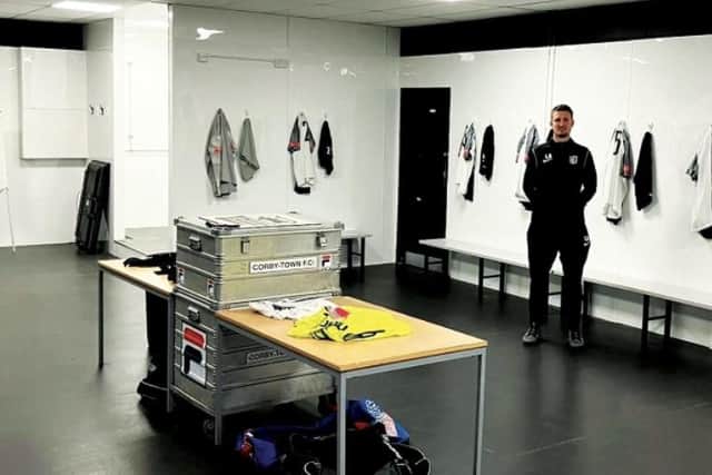 Corby Town manager Lee Attenborough in the newly-refurbished dressing-room at Steel Park