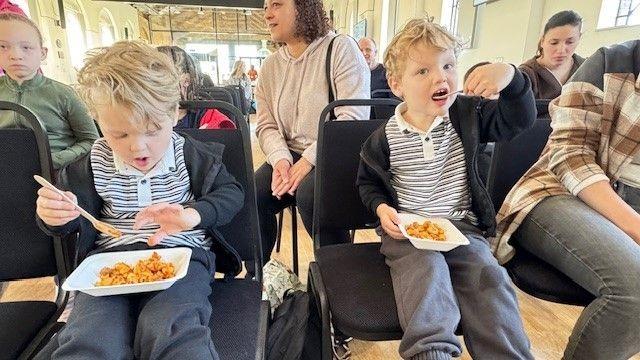 Children enjoying the food at Nourishing Connections.