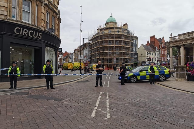 The scene in Northampton town centre today (Tuesday) as police and bomb squad units deal with "suspicious object" found in doorway near Market Square